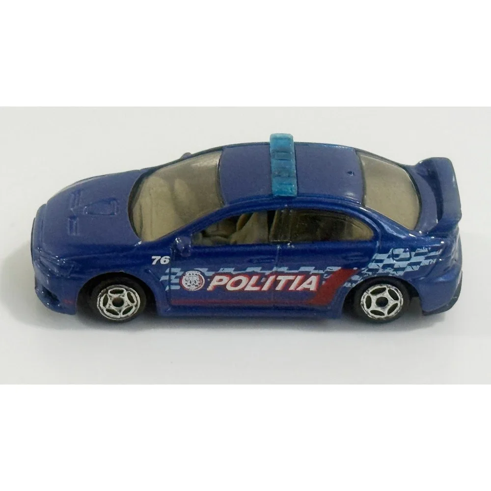 MATCHBOX 2010 BLUE MITSUBISHI EVOLUTION X POLICE 1:62 DIE-CAST TOY CAR MATTEL‎